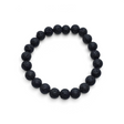 Rare Earth Gallery 8mm black lava stone bead bracelet with a natural porous texture on a white background