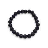 Rare Earth Gallery 8mm black lava stone bead bracelet with a natural porous texture on a white background