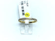 Yellow gold IP plated titanium band with white CZ pave along half of the 2mm ring