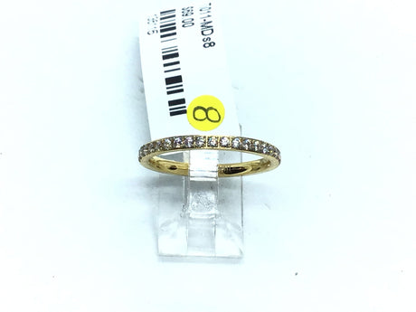 Yellow gold IP plated titanium band with white CZ pave along half of the 2mm ring