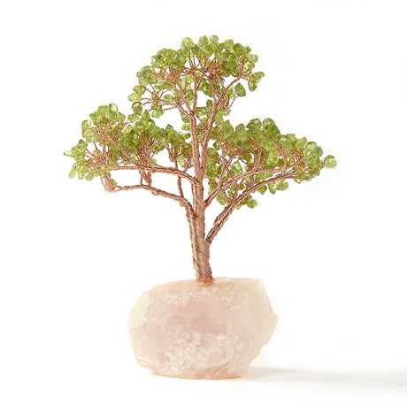 Medium peridot beaded tree with green chips and copper wire branches on a raw rose quartz base