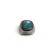 Rare Earth Gallery square larimar cabochon ring with a textured brick pattern on a wide silver band