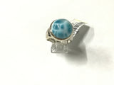Larimar round domed cabochon ring bezel set on a simple silver band