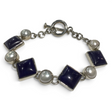 Rare Earth Gallery link bracelet featuring square lapis lazuli stones and round white pearls with a toggle clasp.