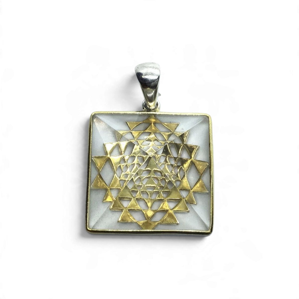 Rare Earth Gallery quartz pyramid pendant in 925 sterling silver with a gold plated mandala accent and simple bail.