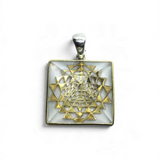 Rare Earth Gallery quartz pyramid pendant in 925 sterling silver with a gold plated mandala accent and simple bail.