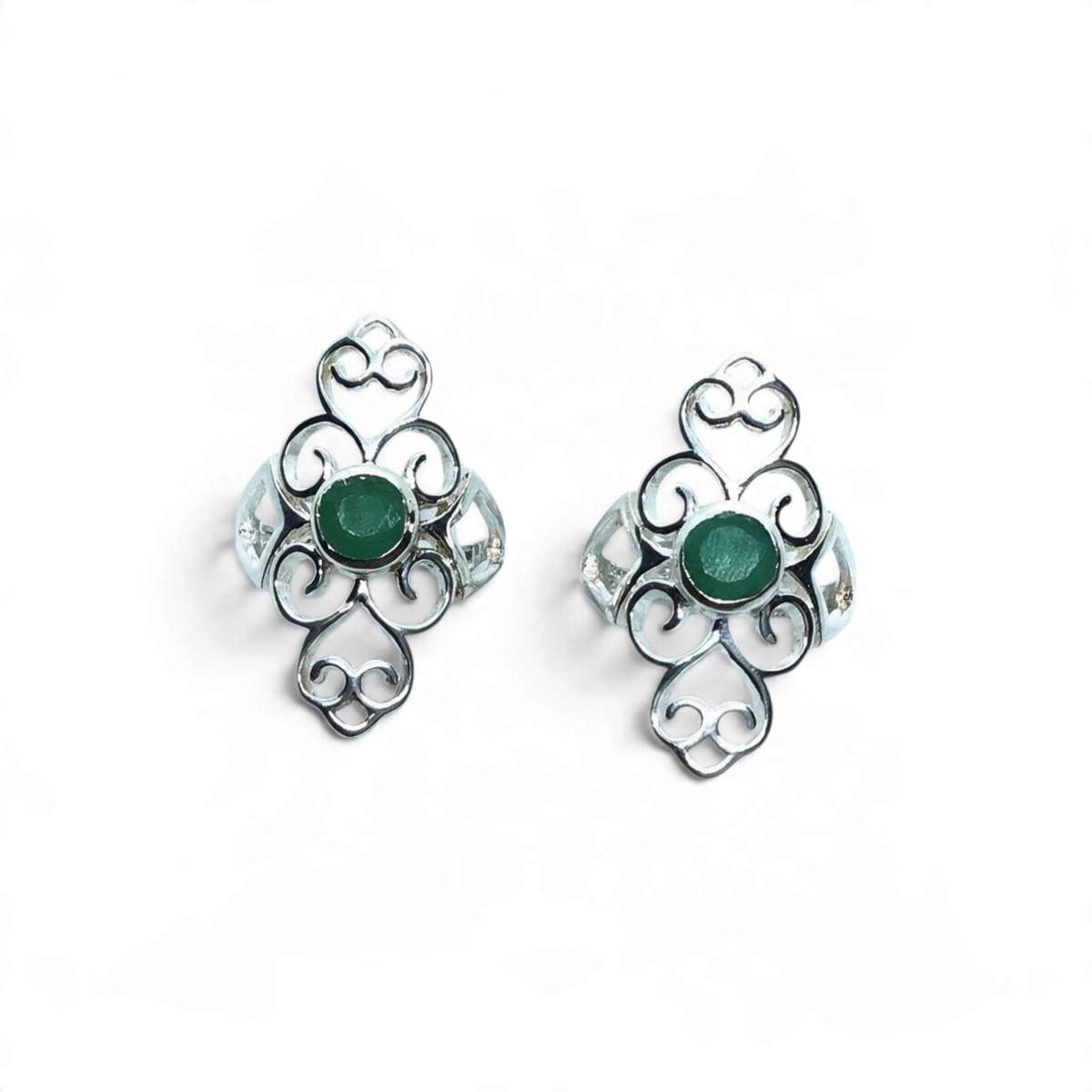 Rare Earth Gallery emerald ring featuring a faceted round green stone on a 925 sterling silver open filigree band.