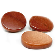 Three red goldstone flat stones with glittering copper sparkle, sold individually as singles