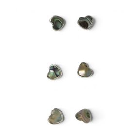 Rare Earth Gallery mini heart stud earrings featuring iridescent abalone shell in a polished silver bezel setting.