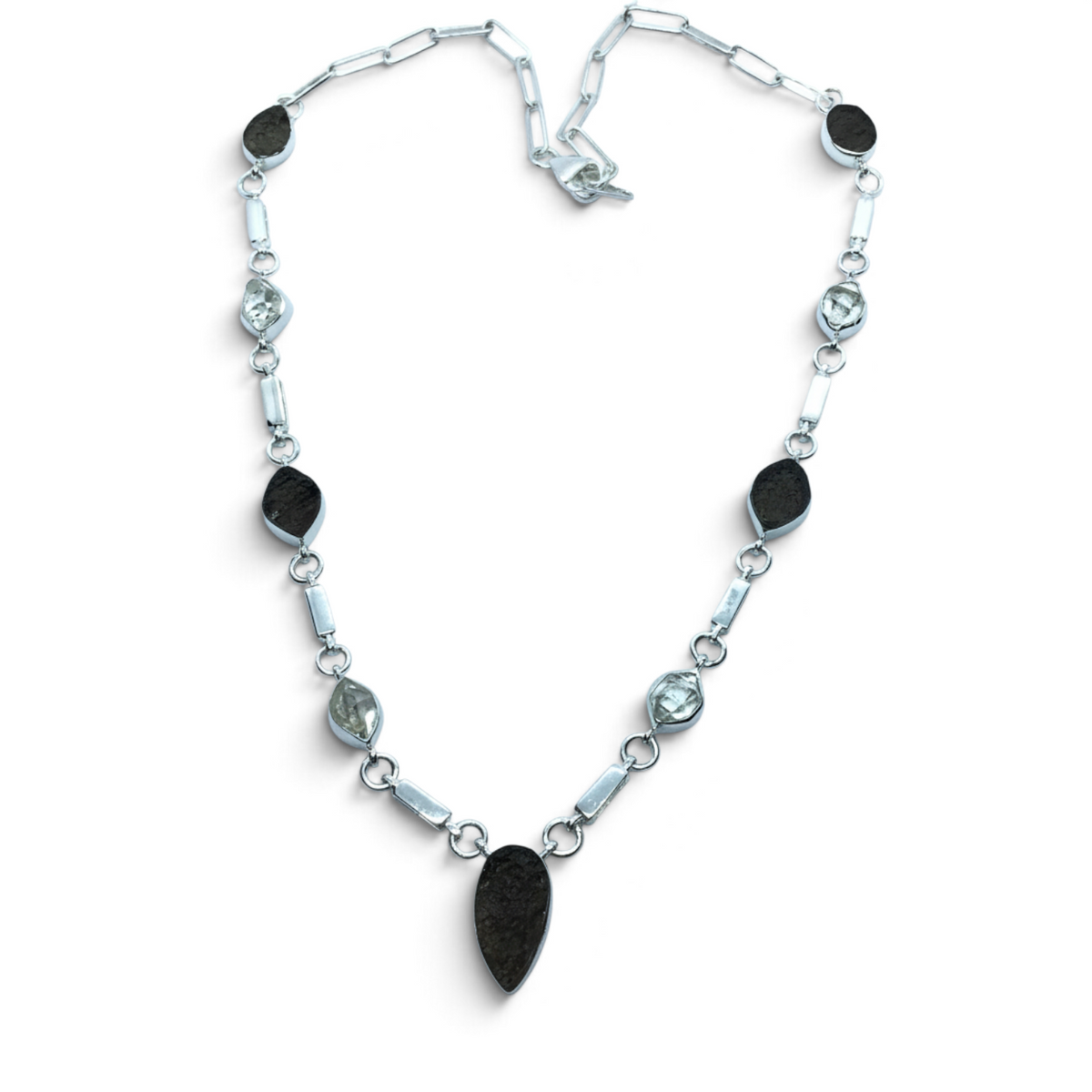 Rare Earth Gallery Agni Manitite Pearl of Fire tektite necklace with five rough geometric stones in silver bezels.