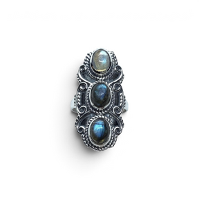 Rare Earth Gallery sterling silver ring featuring three oval labradorite cabochons with filigree and rope details.