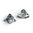 Rare Earth Gallery double-terminated Herkimer Diamond rings in polished silver bezel settings on white background