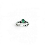 Rare Earth Gallery emerald ring featuring a bezel set faceted oval stone with step shoulder detail on a silver band.