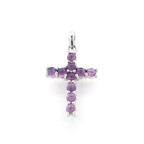 Silver cross pendant of ten prong-set purple amethyst round cabochons, front view