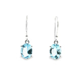 Faceted Blue Topaz Dangle Earrings - Oval
