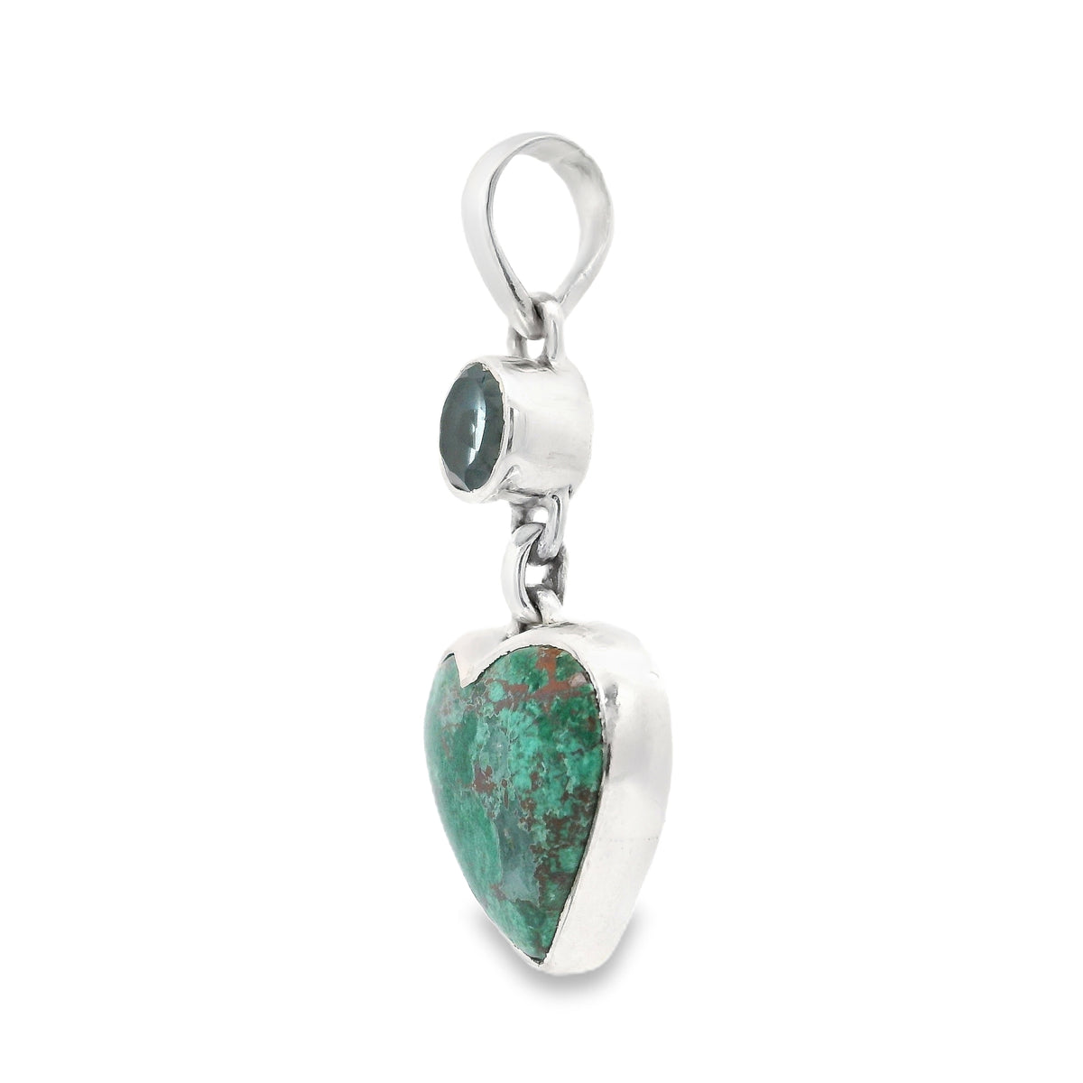 Side profile of the chrysocolla heart pendant with blue topaz accent and silver bezel