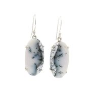 Dendritic opal oval cabochon dangle earrings, prong set in silver with fern-like black dendrites on white
