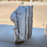 Side edge of the zebra onyx fountain revealing black and white striped layering