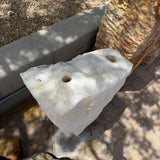 Top of the Ice White Onyx Fountain showing the two drilled water holes and pin hole in the cut surface