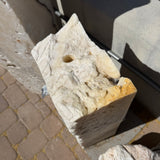 Top of the white fossil onyx column with drilled fountain hole and golden druzy crystal layers