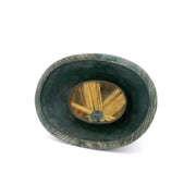Golden rutile quartz ring, star-burst rutile cabochon in oxidized silver oval bezel, top view