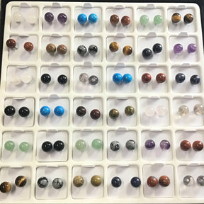 Display tray of 8mm gemstone stud earrings in many stone varieties, round polished cabochons
