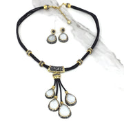 Selenite leather set with four white pear drops in gold and marcasite pave on black cord, with earrings