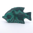 Polished malachite fish carving in deep green swirls with a carved eye, mouth facing left