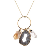 Gold-rimmed gray agate slice with citrine point and clear quartz point on gold snake chain