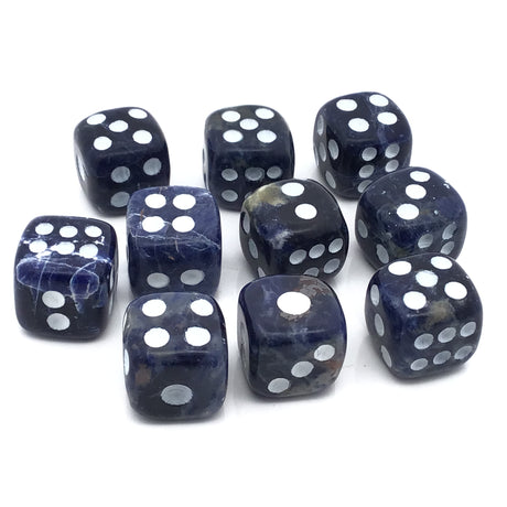 Sodalite dice carvings set of 10, featuring dark blue stones with white dots arranged in two rows.