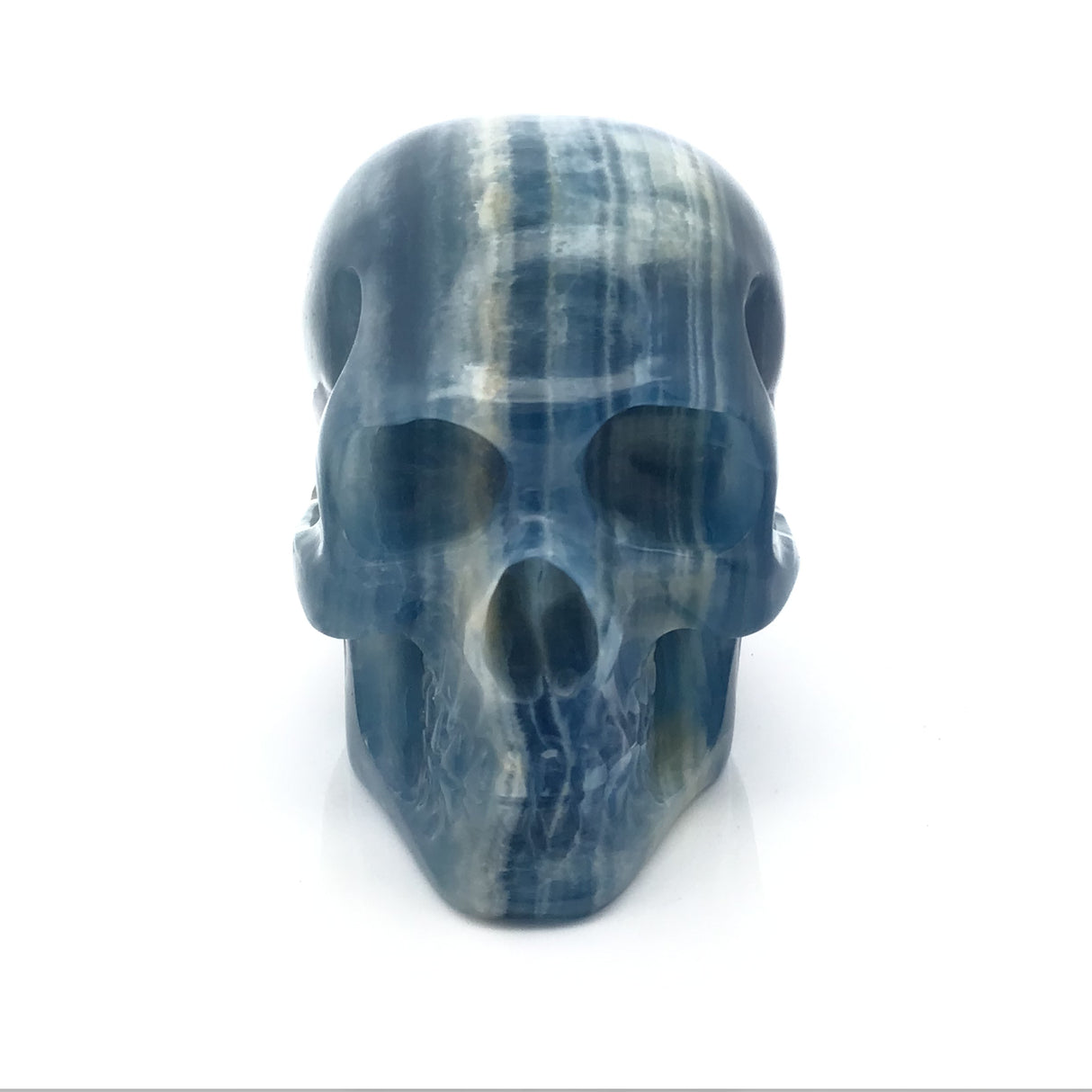 Blue Calcite Skull Carving Small with Linear Banding