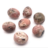 Orbes de rhodochrosite roulée de forme libre