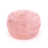 Pale pink rose quartz gemstone sphere stand disc showing natural veining against a white backdrop