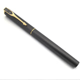 Capped Muonionalusta meteorite pen shown full length, gold clip topped with a crosshatched meteorite pennant