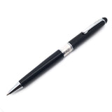 Muonionalusta meteorite pen in black with a white gold IP plated barrel band, angled on white