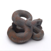 Shiva jasper coiled snake carving in red and gray, head raised with open striking mouth, side view