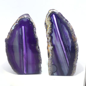 Pair of purple dyed agate mini geode end cuts, matching polished faces, cut bases