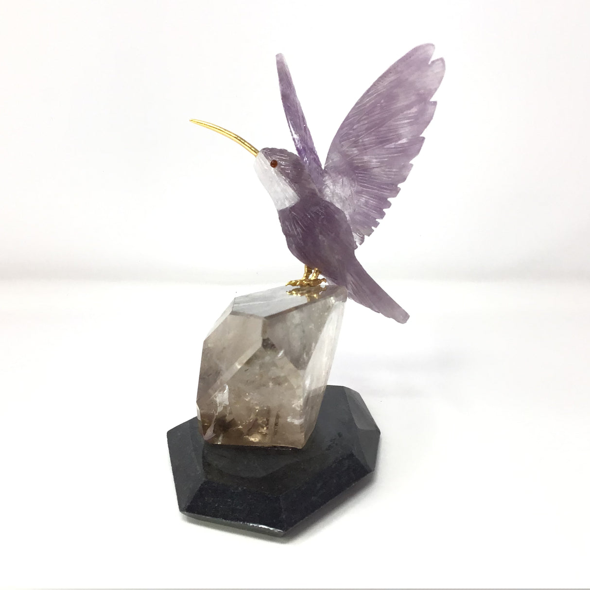 Hand-Carved Amethyst Hummingbird Perched on Faceted Clear Smoky Quartz Crystal with Black Marble Base