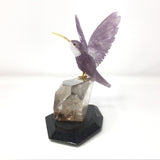 Hand-Carved Amethyst Hummingbird Perched on Faceted Clear Smoky Quartz Crystal with Black Marble Base