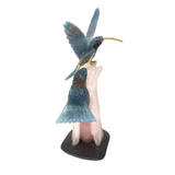 Hand-Carved Blue Calcite Hummingbird Duo Perched on Carved Rose Quartz Tree Trunk with Black Marble Base