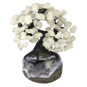 Clear quartz gemstone tree with chip foliage on a rounded gray druzy amethyst geode base