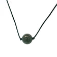 Fancy jasper 10mm mottled green round bead centered on a black cord choker