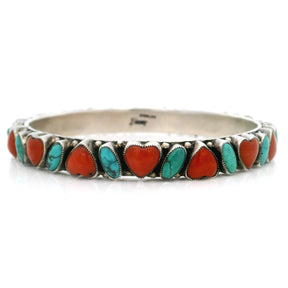 Turquoise and coral bangle bracelet with red coral hearts and turquoise ovals in silver bezels