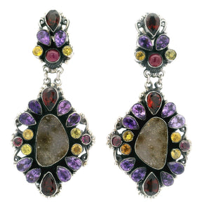 Ornate silver drop earrings with freeform druzy centers, amethyst pears, garnet and yellow sapphire accents