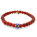 Bracelet 6 mm en corail rouge avec perle œil grec