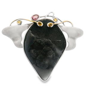 Black quartz druze pendant with yellow sapphires and pink tourmaline set in 18k gold wire.