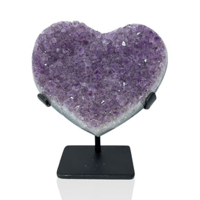 Amethyst crystal heart of lilac druzy points on a black metal post stand, front view on white