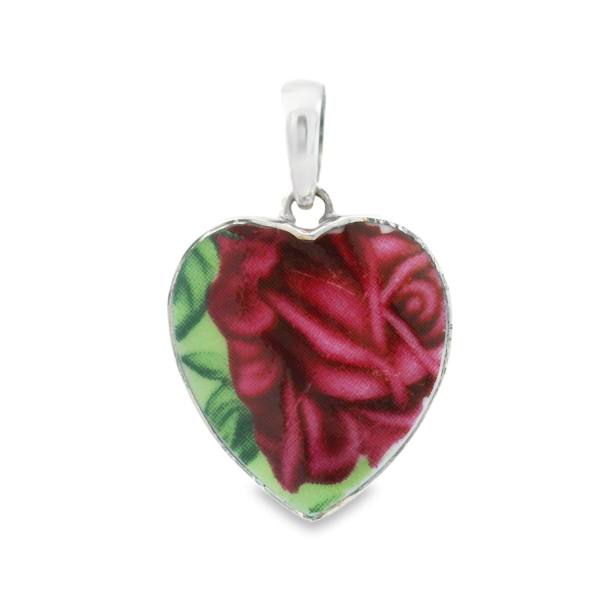 Porcelain rose pendant, heart shape with a deep magenta rose and green leaves in a silver bezel