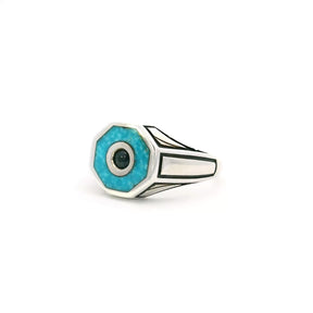 Turquoise and blue sapphire ring in an octagonal design, set in silver with black detailing, size 10.