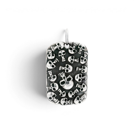 Sterling silver dog tag pendant covered in clustered oxidized skulls